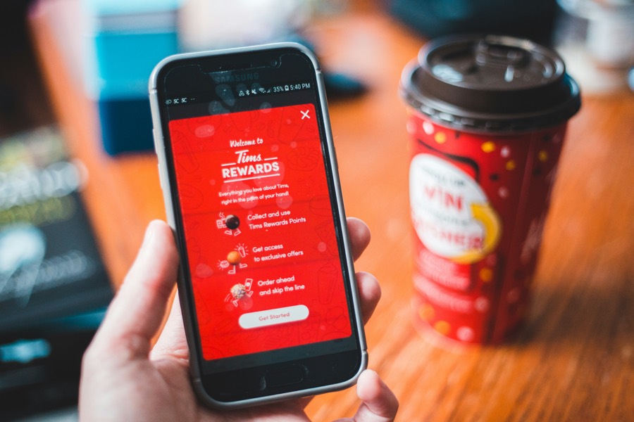 Phone showing a scan-and-win prize campaign